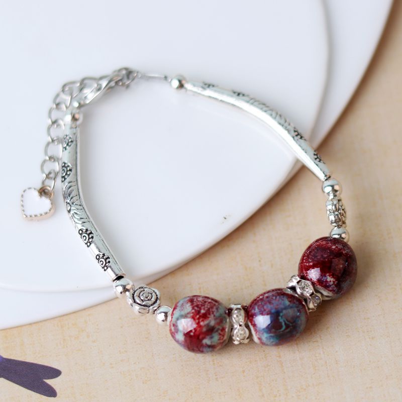 Tubo de curvatura al por mayor cuentas de cerámica pulsera de cuerda hecha a mano